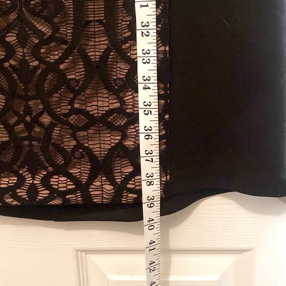 Black cocktail dress with cap sleeve and lace front panel. - Picture 9 of 9